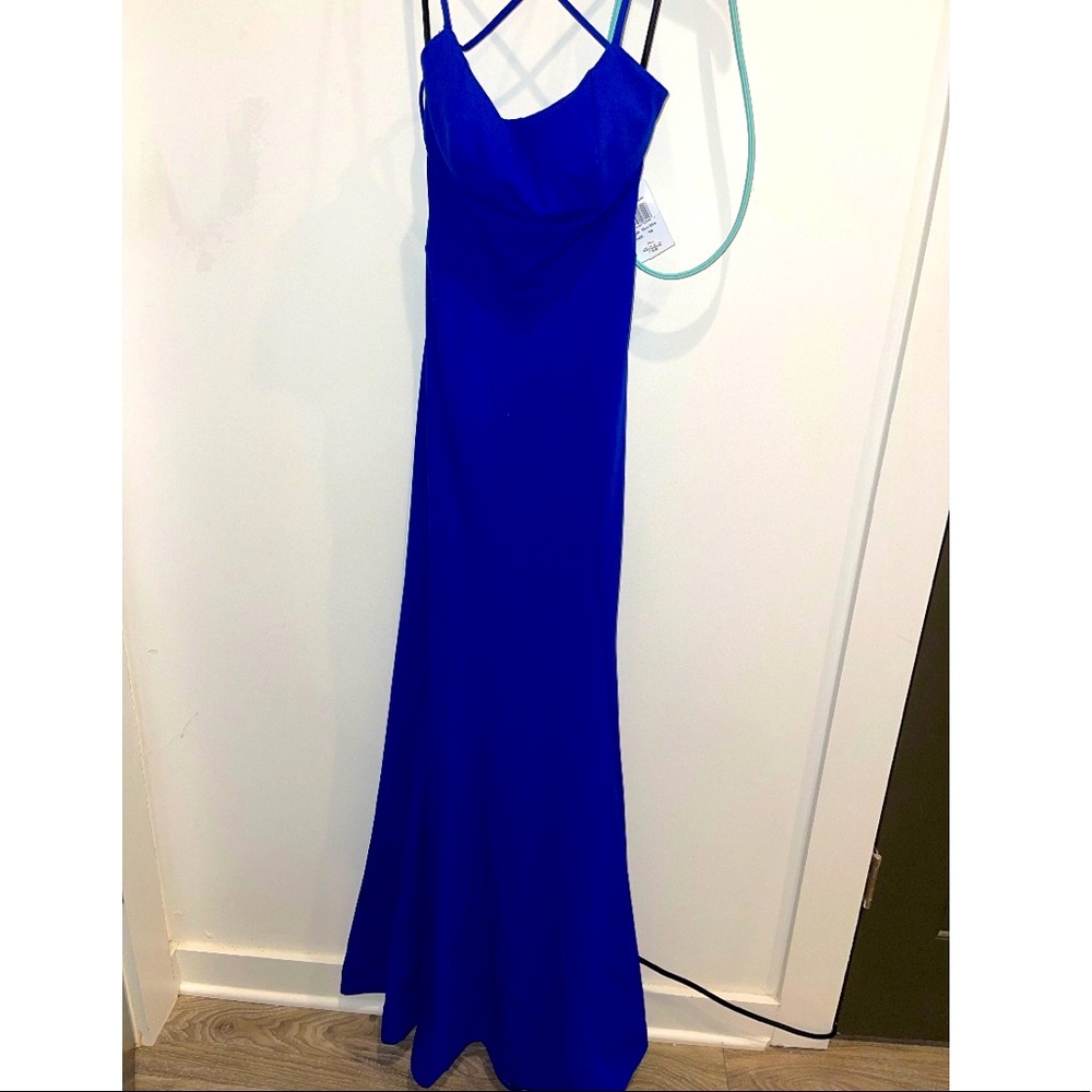 Dillard’s formal/ prom dress. New with tags. Size 3/4 (size small). Royal blue.